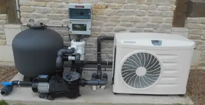 electric heater installation services with connected outdoor heating system equipment in Fort Wayne, IN