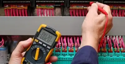 electrical service showing professional testing and troubleshooting of electrical panel by licensed electricians in Fort Wayne, IN