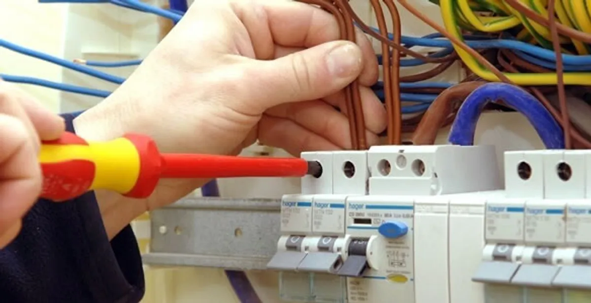 electrician services performing professional electrical panel wiring and connections in Fort Wayne, IN