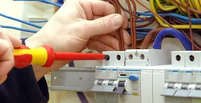 electrician services performing professional electrical panel wiring and connections in Fort Wayne, IN