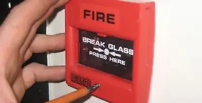 fire alarm installation service showing manual fire alarm pull station installed by licensed electricians in Fort Wayne, IN