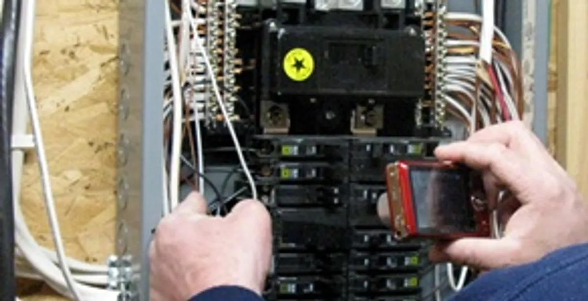 Home electrical inspection of circuit breaker panel by licensed electrician in Fort Wayne, IN