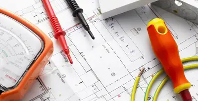 licensed electrician planning and testing electrical systems using professional tools in Fort Wayne, IN