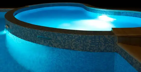 pool light installation and repair services highlighting illuminated pool interior lighting in Fort Wayne, IN