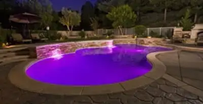 pool light installation and repair services illuminating a residential swimming pool in Fort Wayne, IN