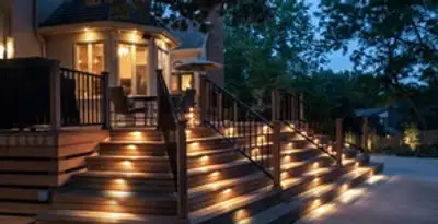 Residential electrician installing outdoor lighting for home safety in Fort Wayne, IN