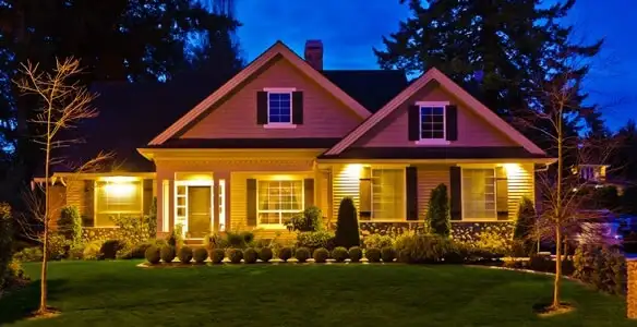 security light installation services illuminating a residential exterior at night in Fort Wayne, IN