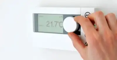 Thermostat installation service with professional adjusting temperature control in Fort Wayne, IN